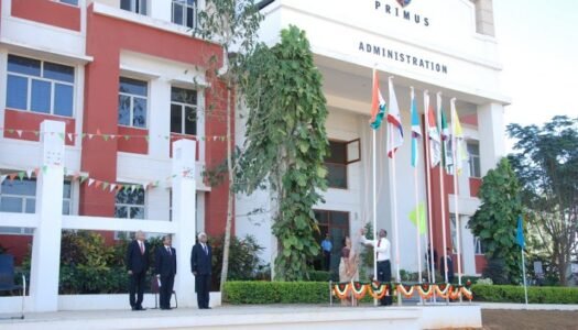 Primus Public School building surrounded by lush greenery, featuring modern architecture and a serene, student-friendly environment